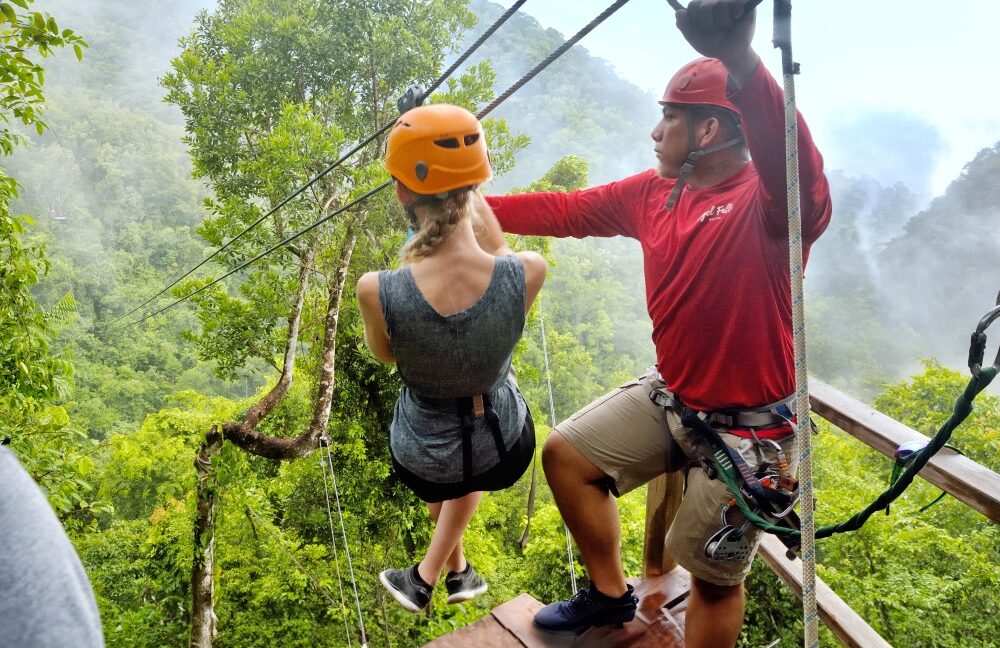 Woman begins a zipline run